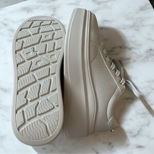 Cream platform pebbled faux leather chunky sneakers